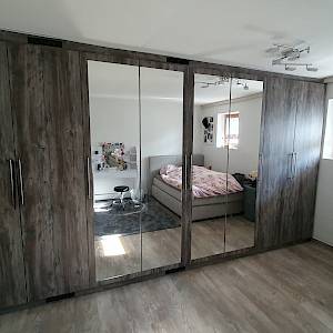 Das Schlafzimmer/ die Ankleide